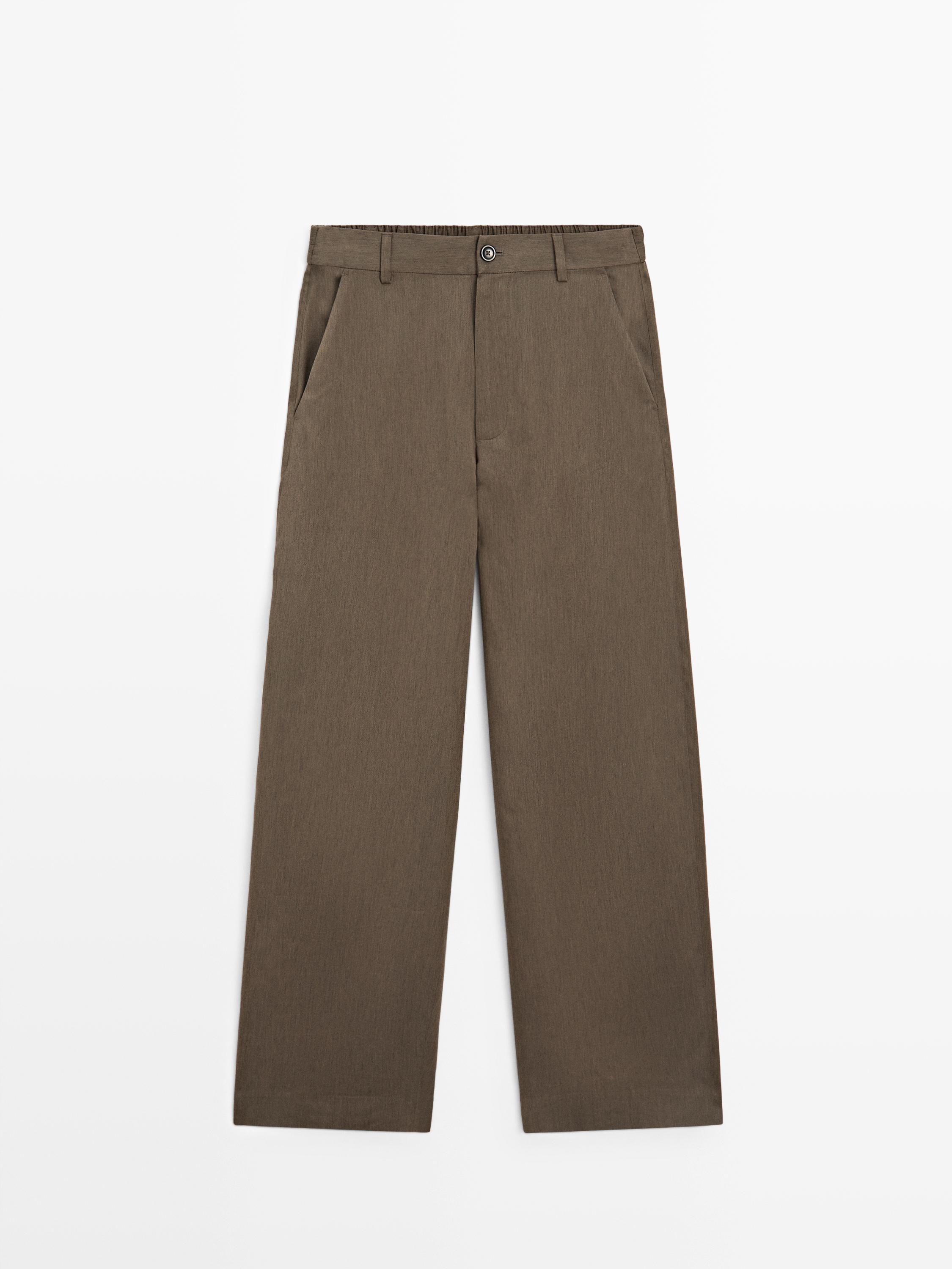 Flowing trousers with elasticated waistband